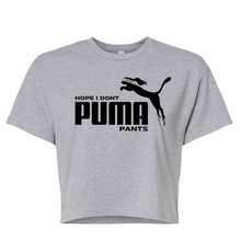 Load image into Gallery viewer, A heather gray short-sleeve crop top t-shirt featuring a black graphic print of the Puma cat logo and the text 'HOPE I DONT PUMA PANTS' on the front, displayed against a solid white background.
